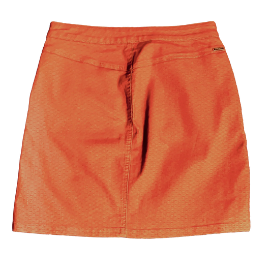 Back view of orange textured skirt with seam detail on plain background