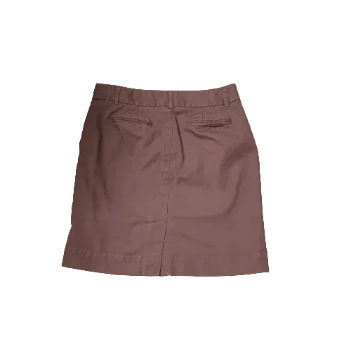 Brown Loft mini skirt with belt loops and back welt pockets on a plain background