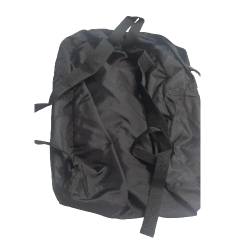 Black Nike backpack with shoulder straps, simple design on white background