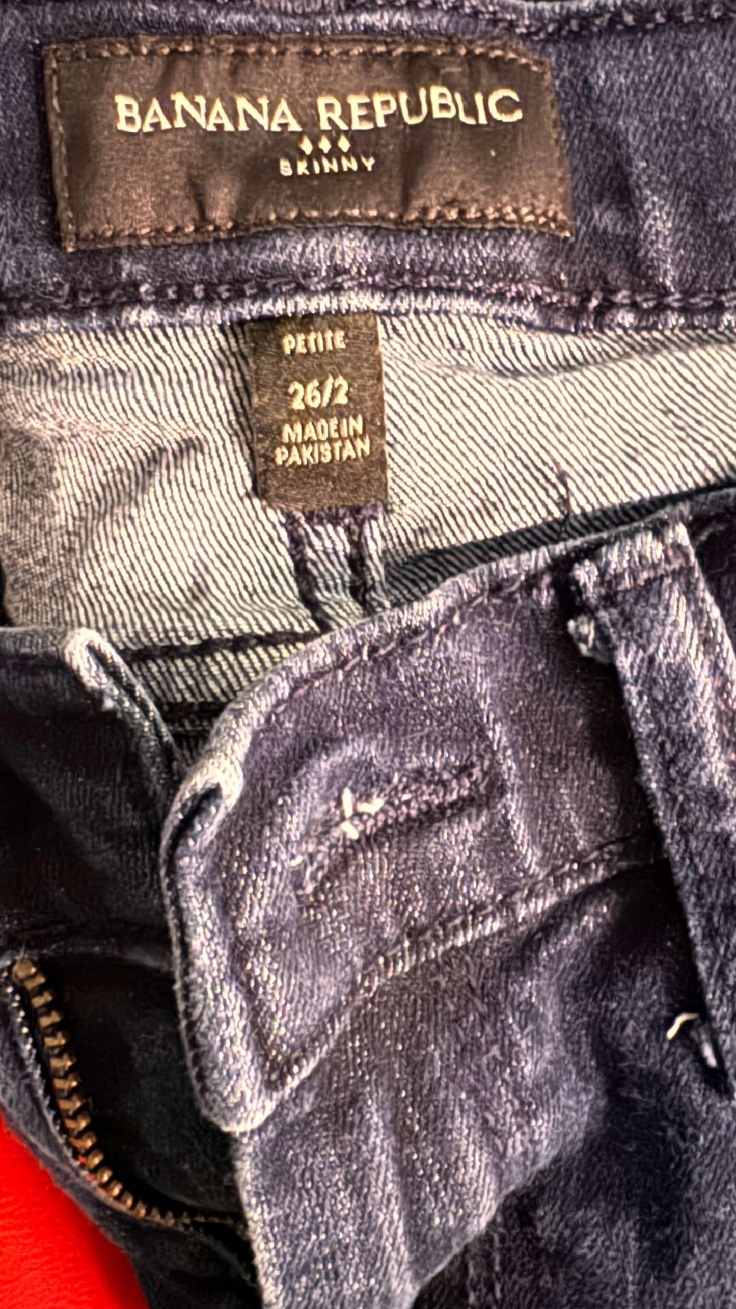 Banana Republic skinny jeans label, petite size 26/2, made in Pakistan, denim close-up