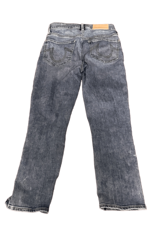 Back view of True Religion blue denim jeans with signature stitched pockets