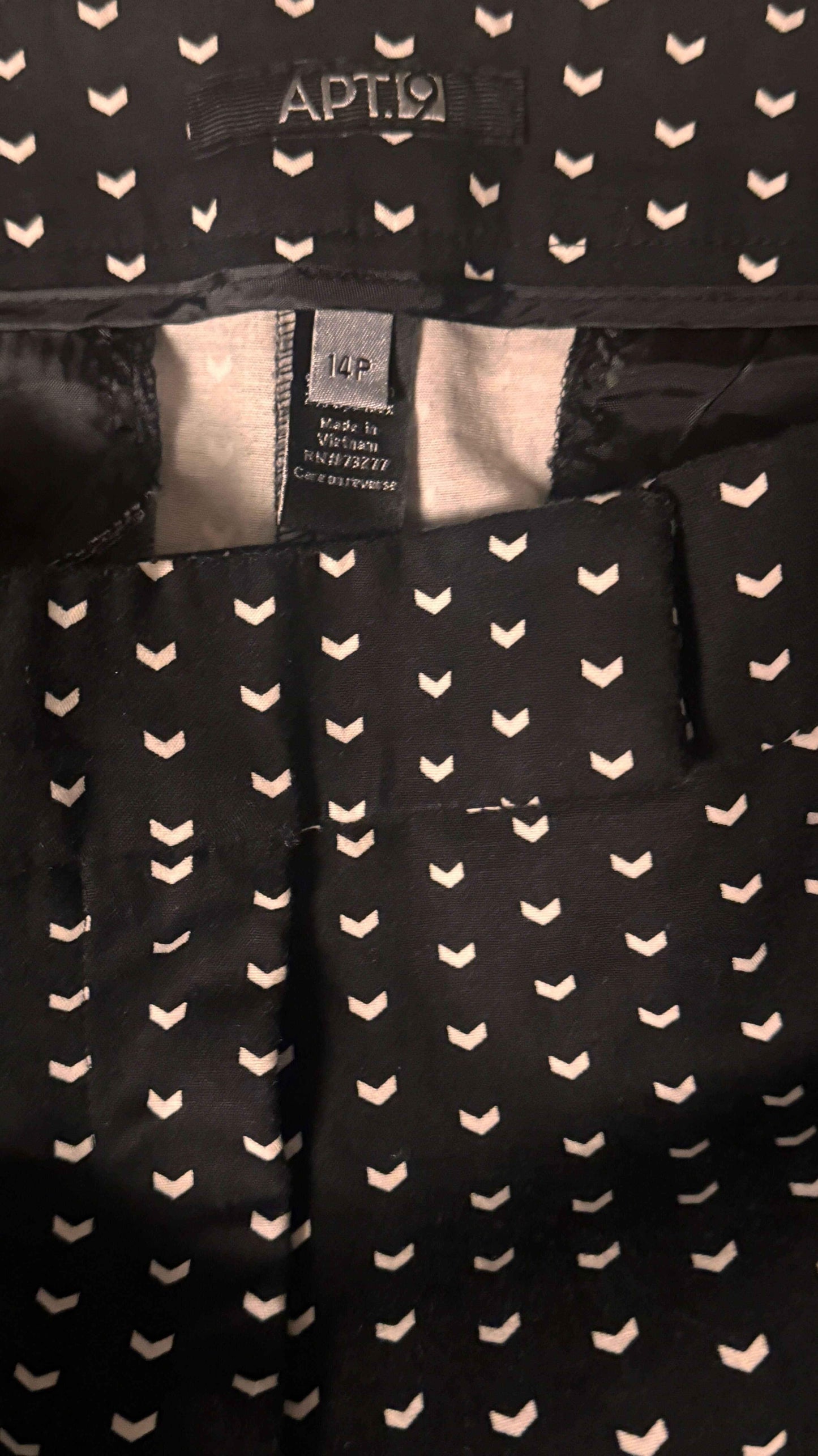 APT. 9 black pants with white chevron pattern and 14P size label