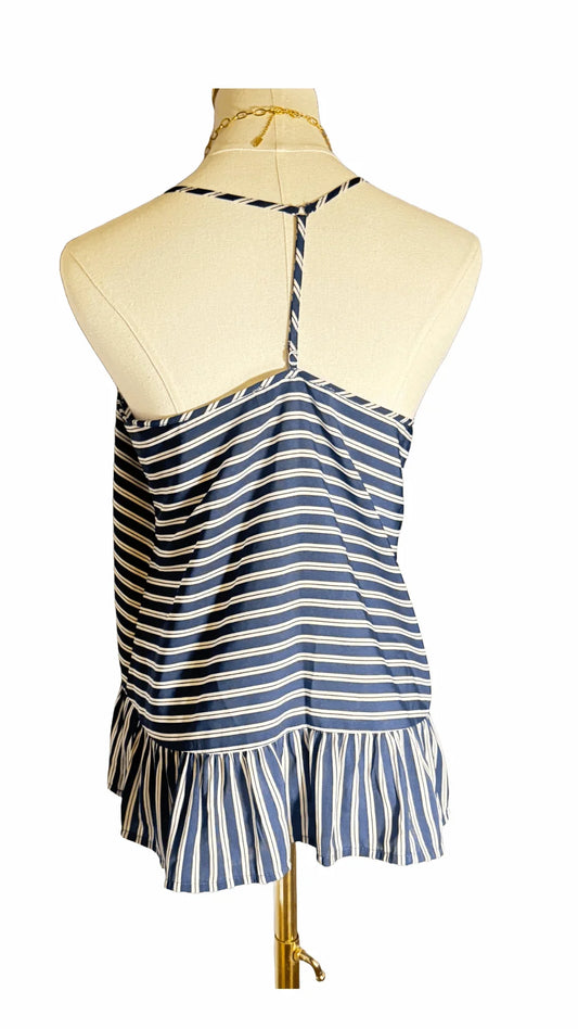Back view of blue striped Abercrombie tank top with ruffled hem on mannequin