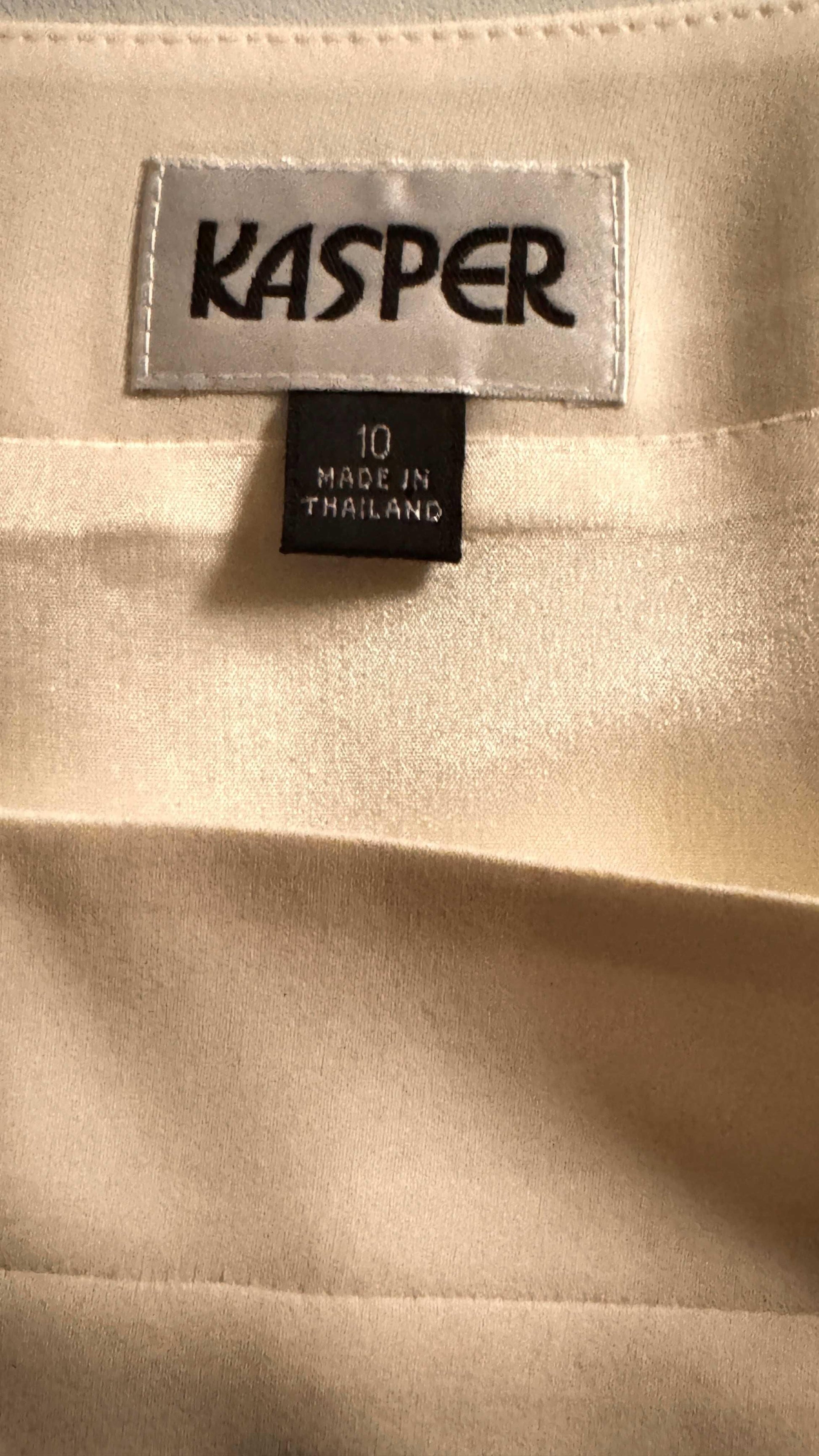 Kasper blouse size 10 clothing label on cream fabric, made in Thailand