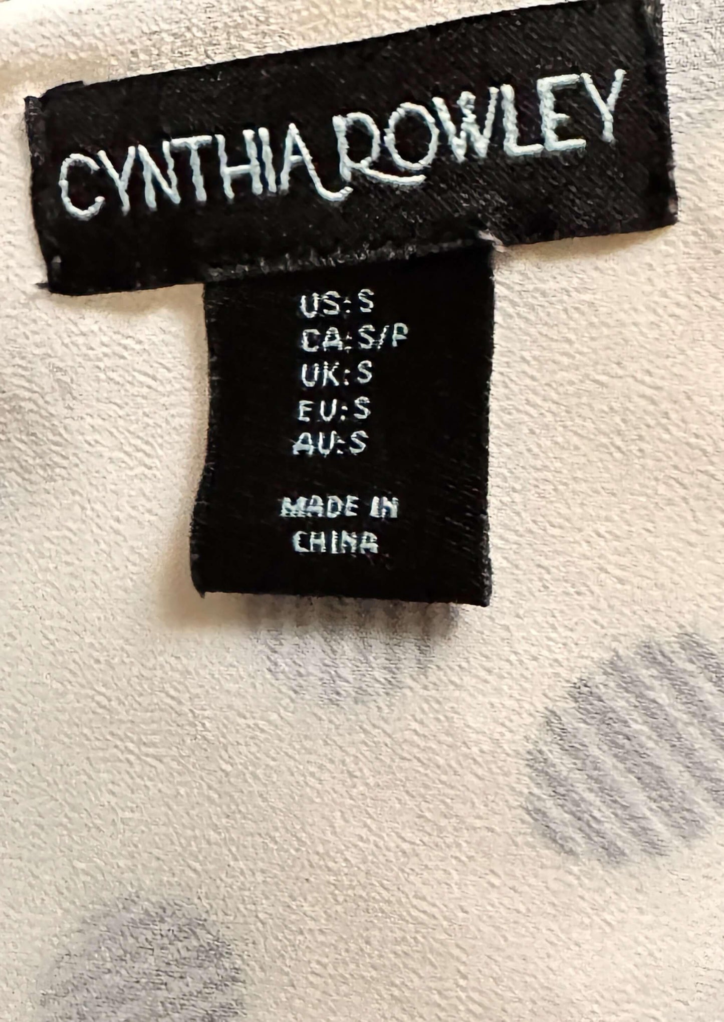 Cynthia Rowley black garment label showing size small and made in China on fabric