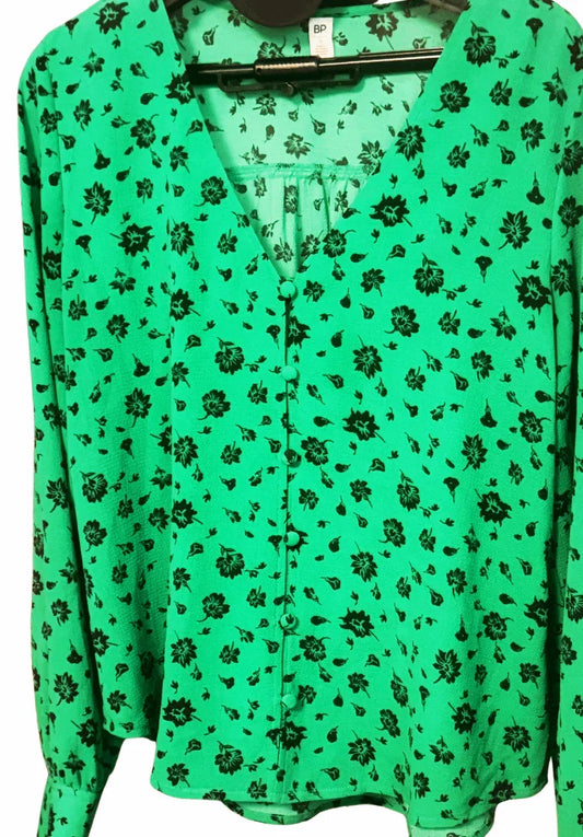 Green BP blouse with black floral print, v-neck, long sleeves, and button front detail