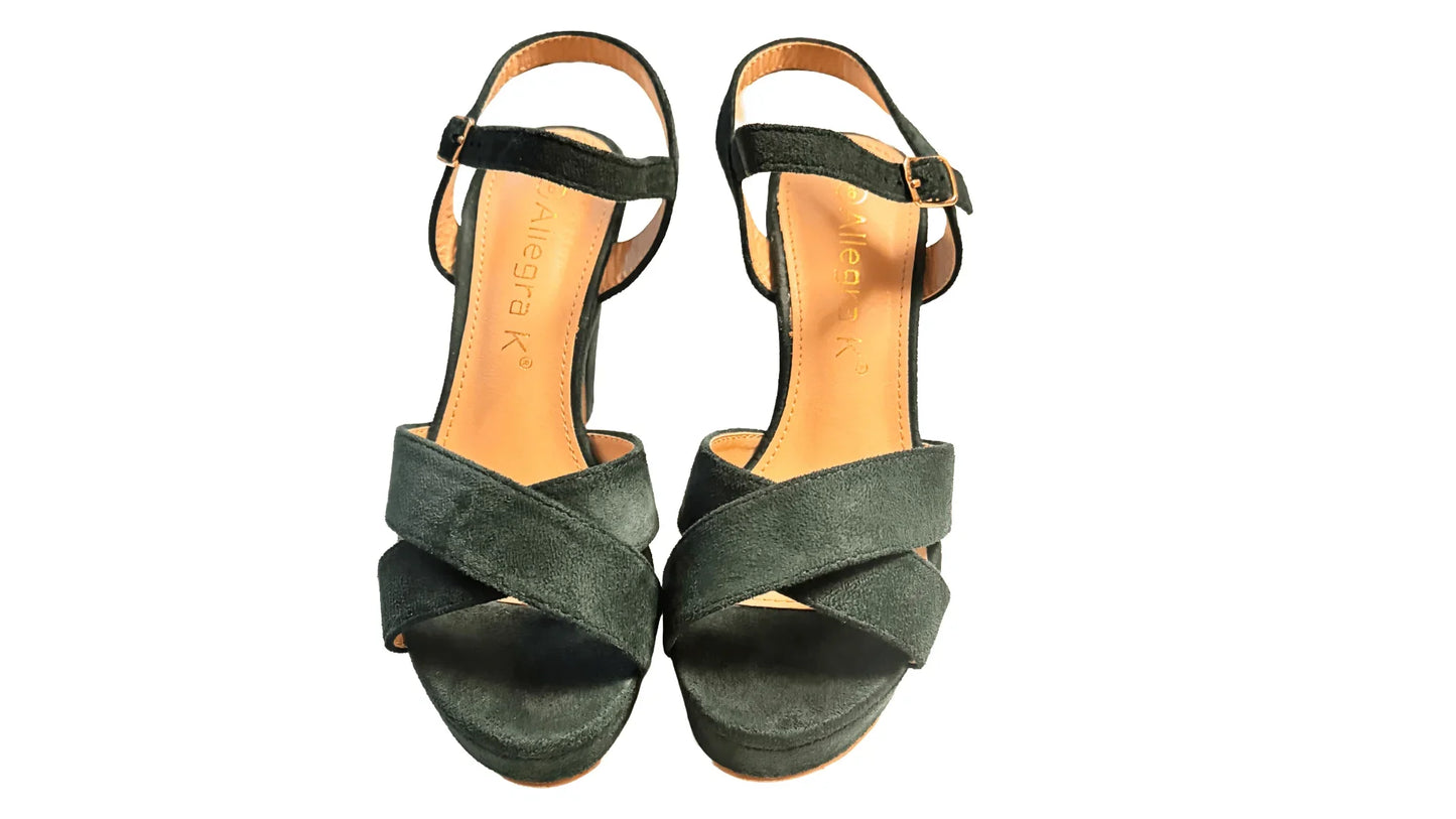 Green suede high heels with ankle strap and crisscross front design on white background