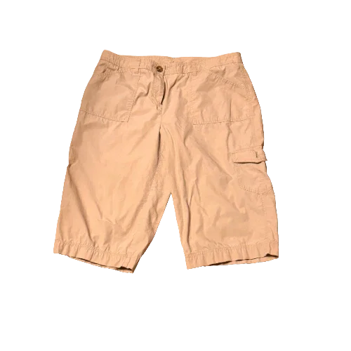 Beige cargo shorts with elastic waistband and side pockets on white background