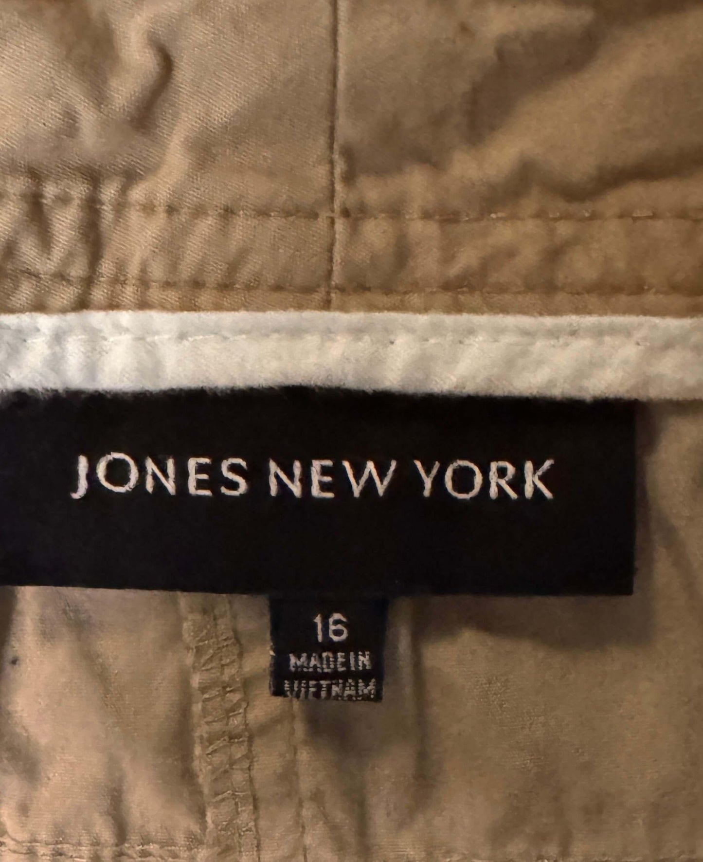 Jones New York clothing label on beige fabric, size 16, made in Vietnam