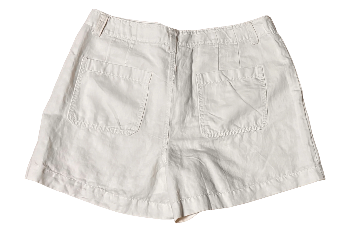 White linen shorts with back pockets, casual women's summer clothing on black background