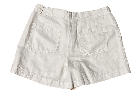 White linen shorts with back pockets, casual women's summer clothing on black background