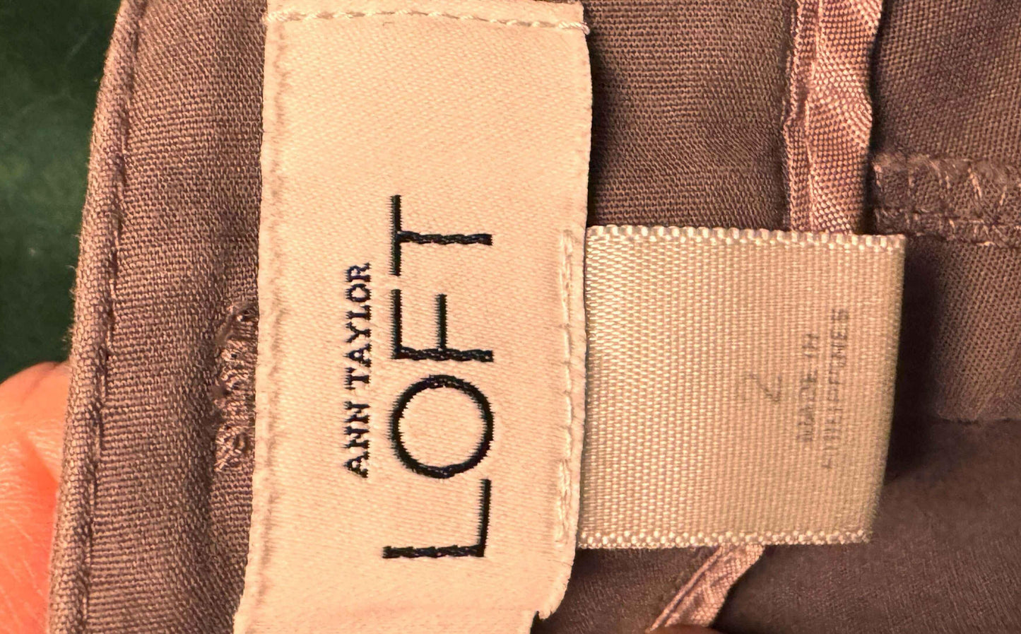 Ann Taylor Loft skirt brown fabric with clothing tags and stitching details