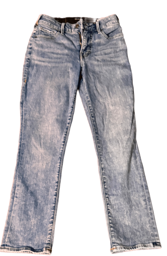 Light blue True Religion denim pants with a straight leg fit, displayed on a plain background
