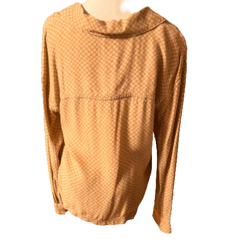 Beige VANS checkered shirt with long sleeves shown from the back on a hanger