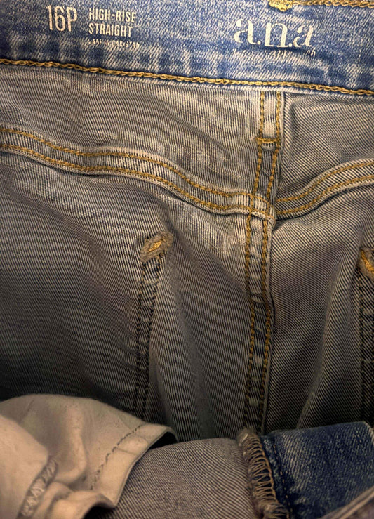 Close-up of a.n.a 16P high-rise straight denim pants interior label and stitching detail