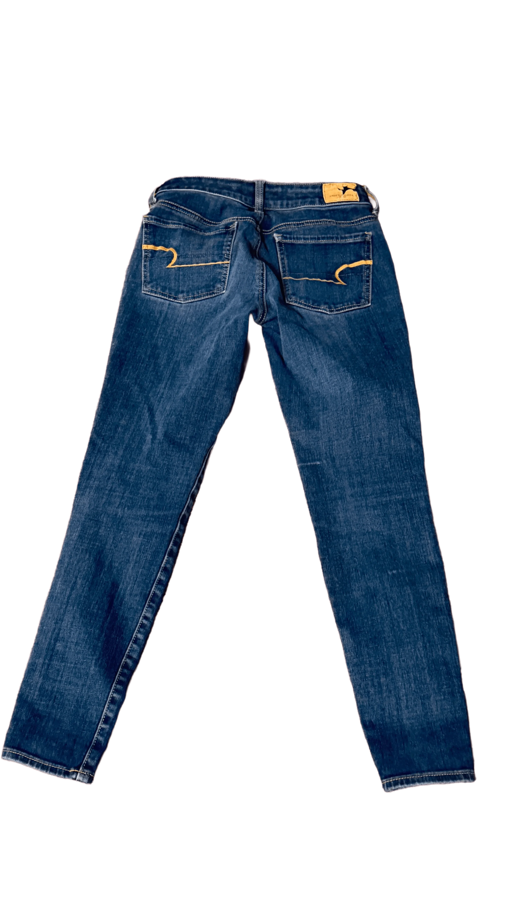 Back view of blue American Eagle jeans with signature yellow stitching on pockets