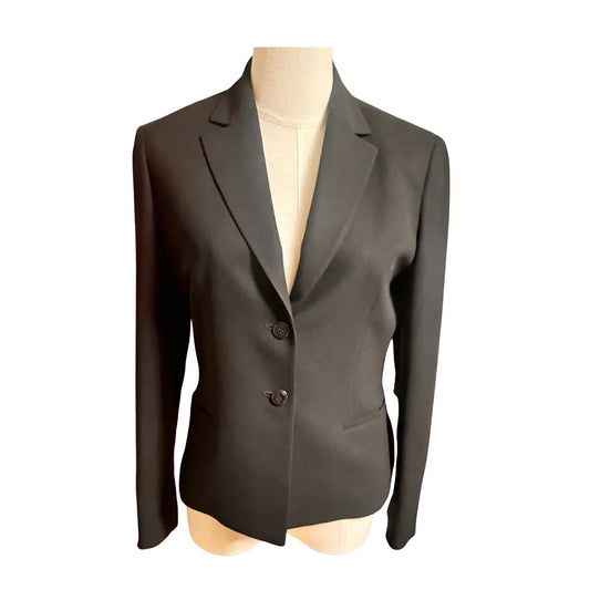 Black blazer front view on mannequin, two-button tailored suit jacket