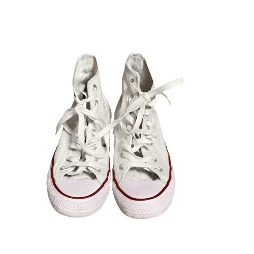 Pair of classic white Chuck Taylor high top sneakers with red accents on white background