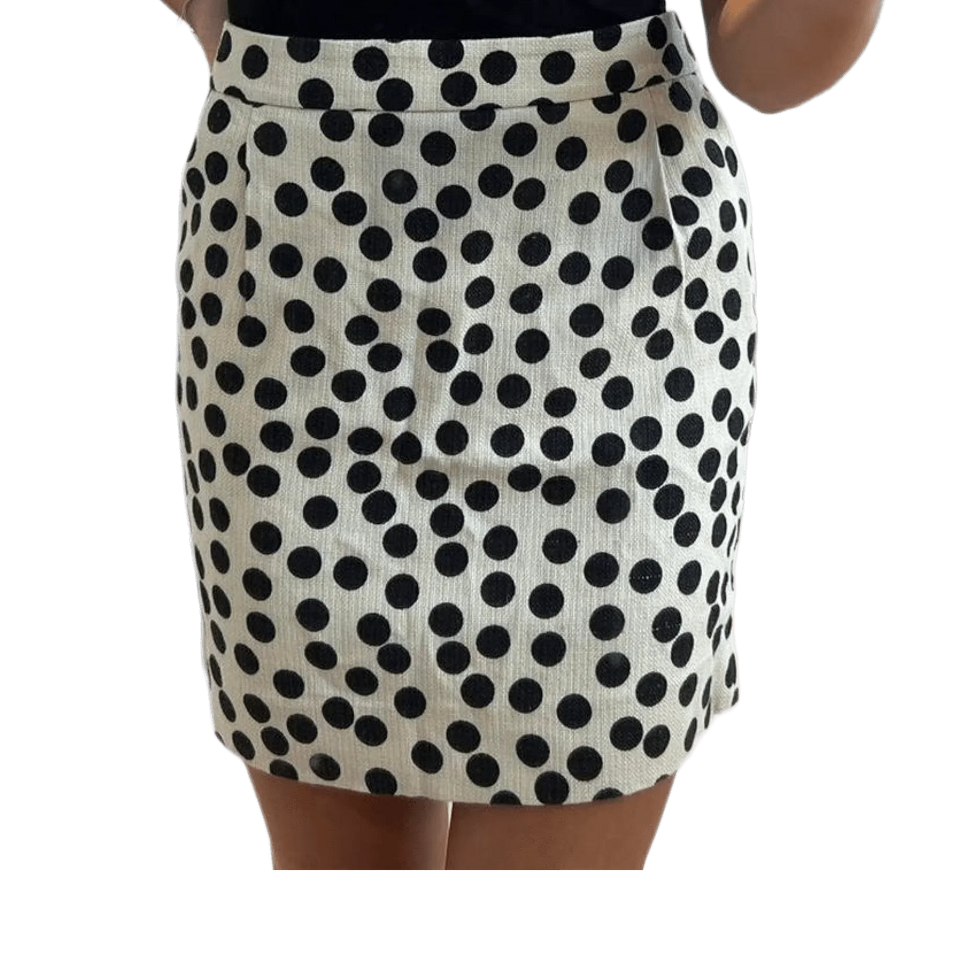 Cream skirt with bold black polka dots, knee-length, stylish women's fashion