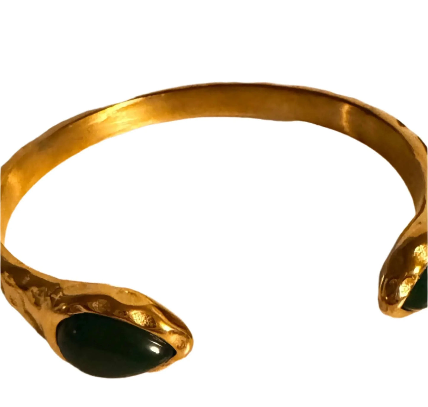 Gold snake bangle bracelet with green stone on white background