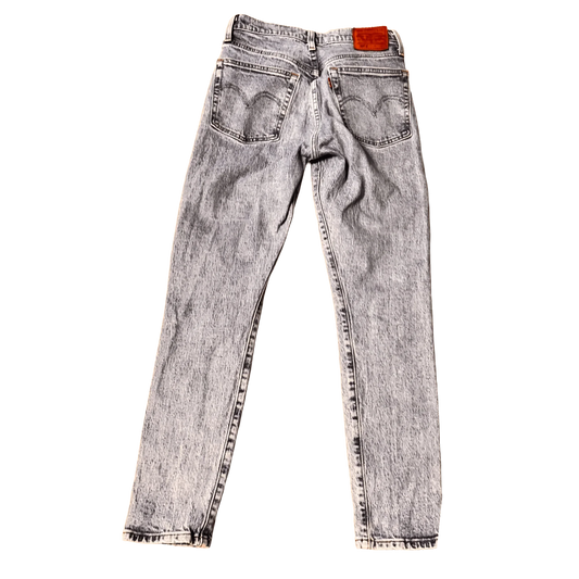 Levi's classic light washed jeans rear view, vintage denim with leather patch