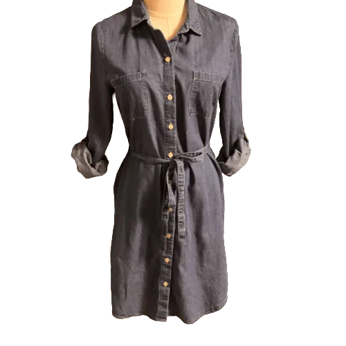 Old Navy denim dress with long sleeves, chest pockets, and waist tie on mannequin