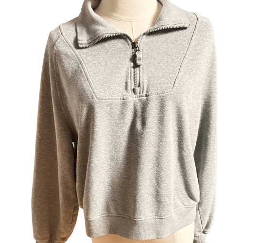 Gray pullover sweatshirt with quarter zip and collar, front view on mannequin
