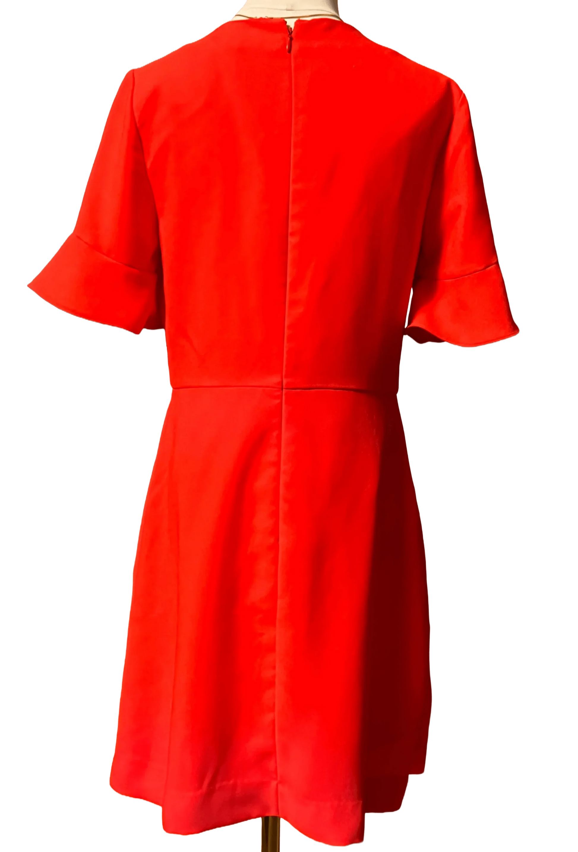 Back view of a bright red Banana Republic dress with short ruffle sleeves on a mannequin