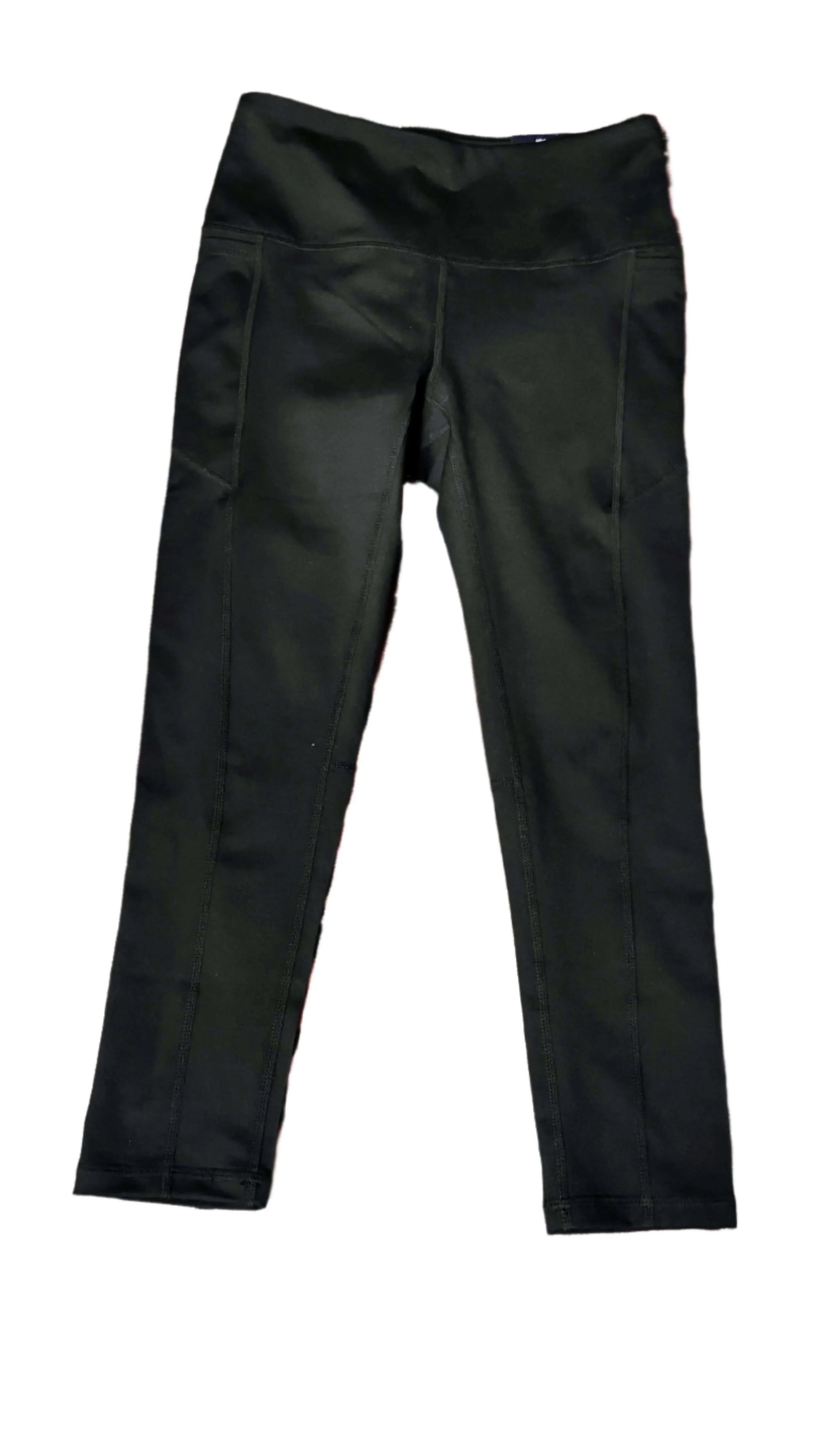 Black Reebok athletic pants with wide waistband on white background