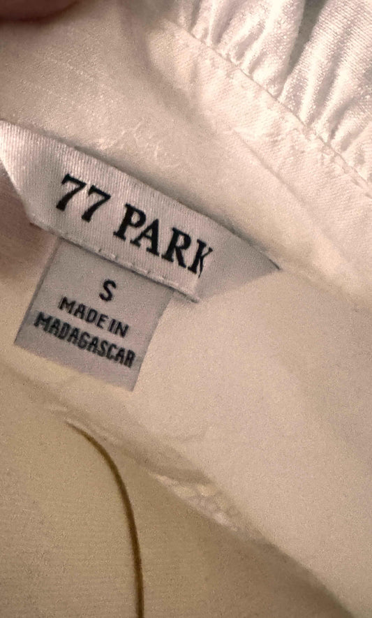 77 PARK clothing label, size S, made in Madagascar, sewn on light fabric