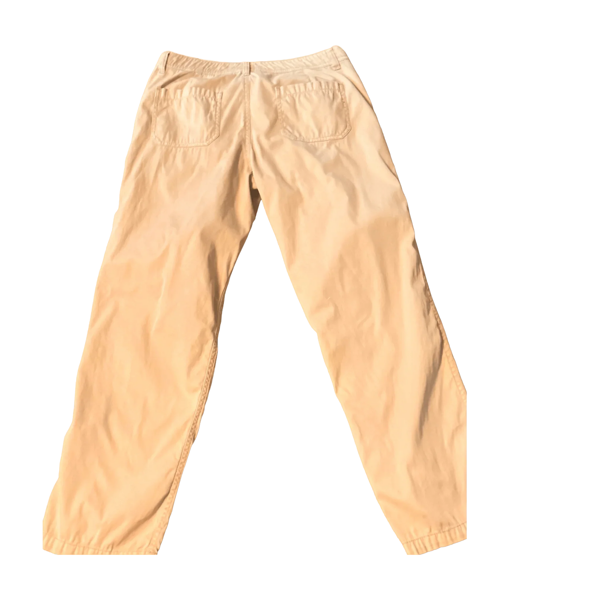 Tan cotton pants with back pockets on a plain background