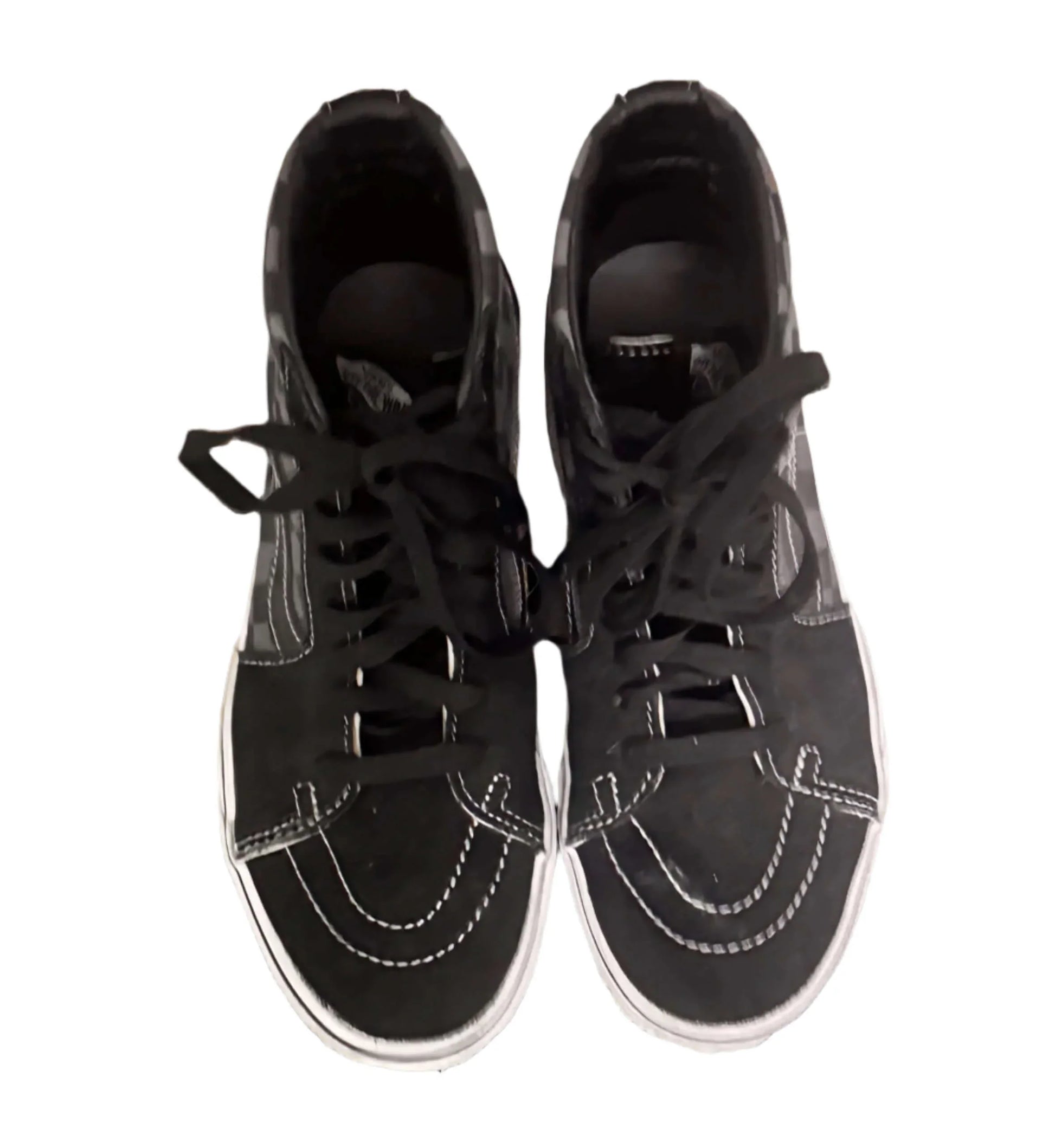 Top view of black Vans high-top shoes with white stitching on white background